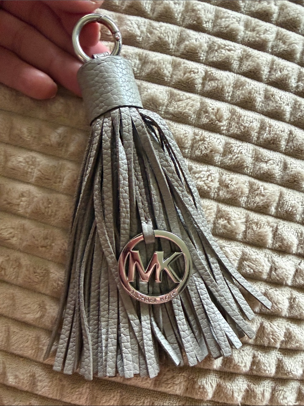 Michael Kors Silver-Gray Leather Tassel Key Charm